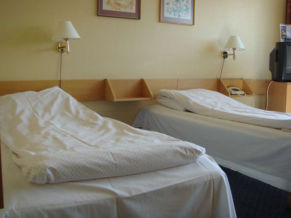 Dombas Hotel Pokoj fotografie