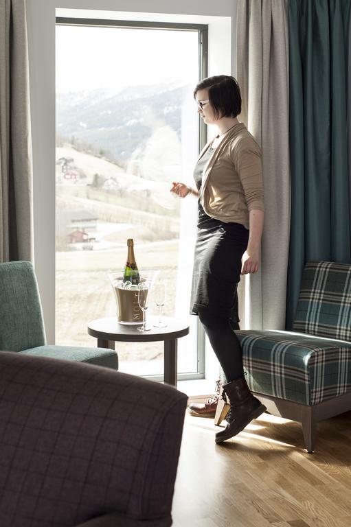 Dombas Hotel Pokoj fotografie